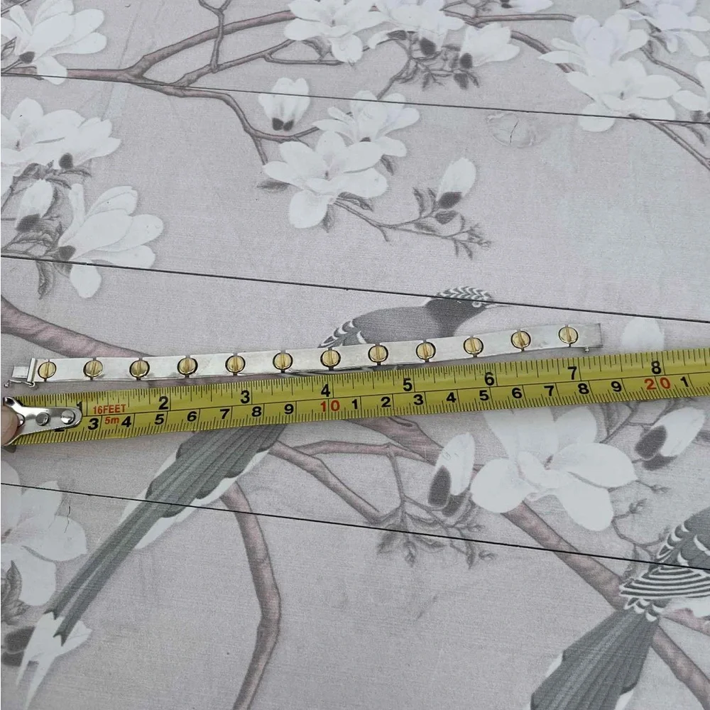 Elegant Silver and Gold Bracelet